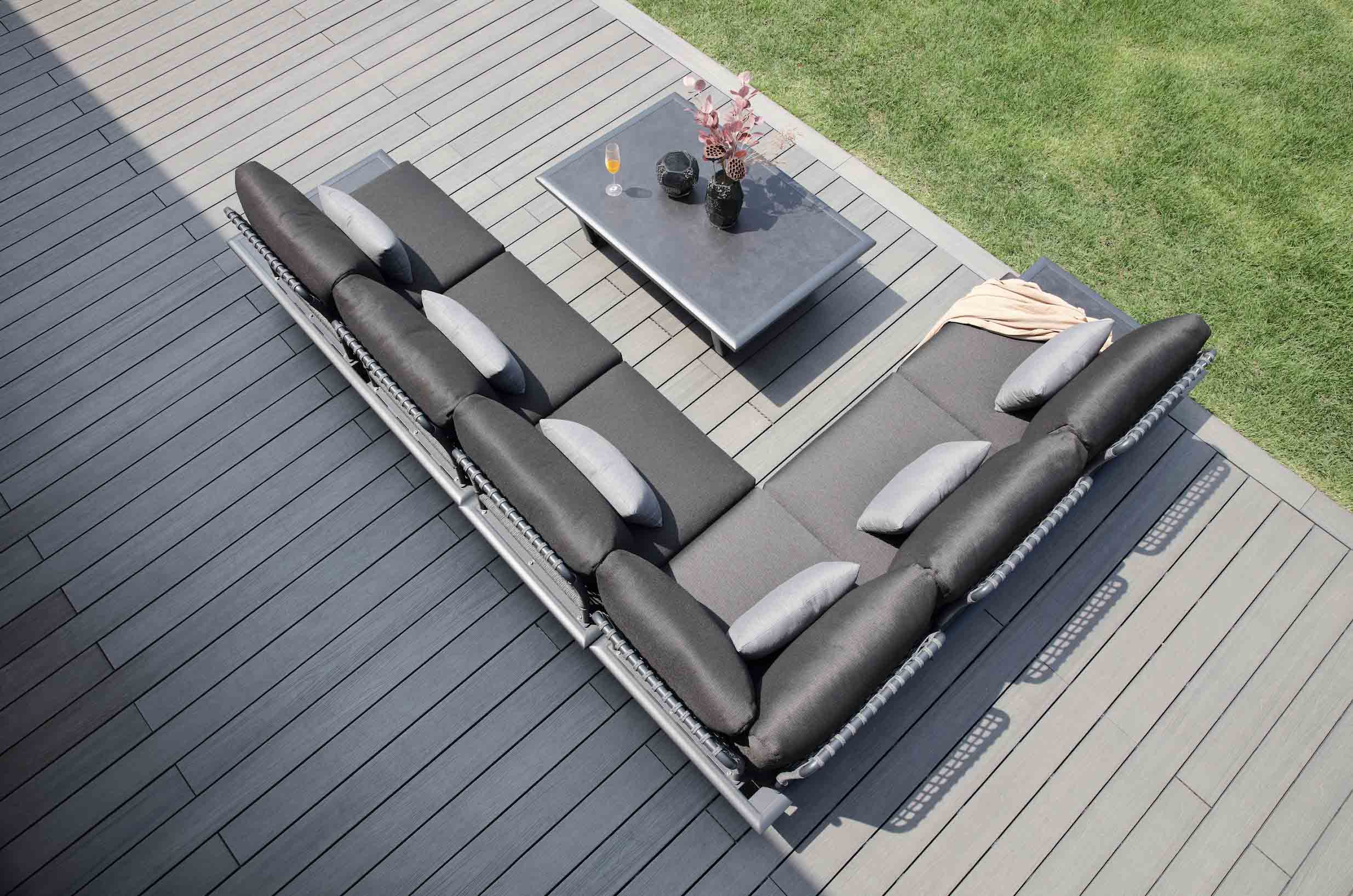Salon de jardin 6 places en aluminium inoxydable avec tissu 100% Oléfine gris, déperlant et déhoussable, plateau céramique.