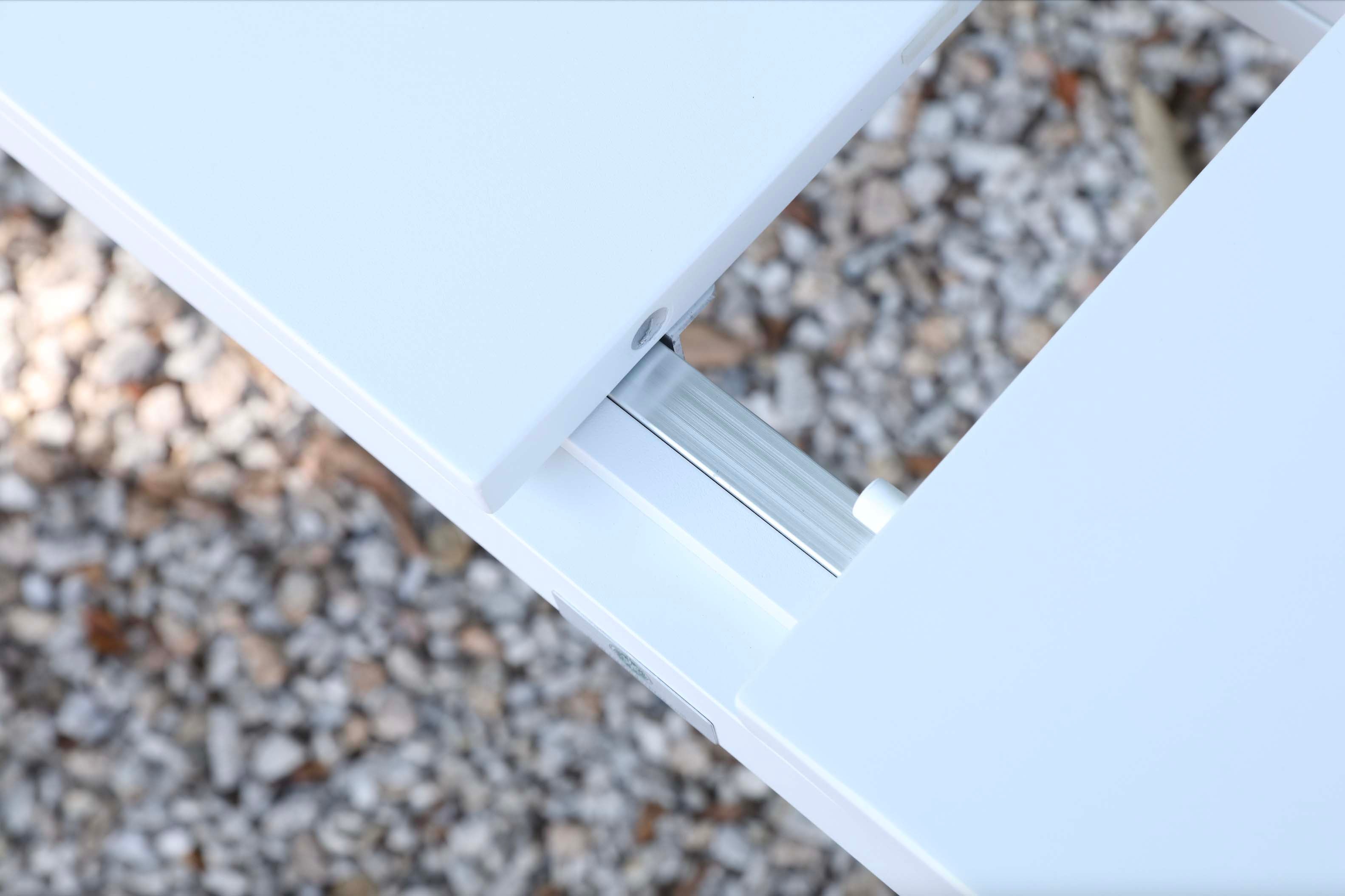Table extensible en aluminium haut de gamme inoxydable blanc, design épuré et durable avec mécanisme solide.