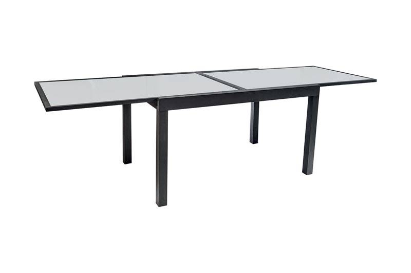 Table extensible en aluminium haut de gamme inoxydable pour petit espace avec plateau fumé élégant et design méditerranéen.