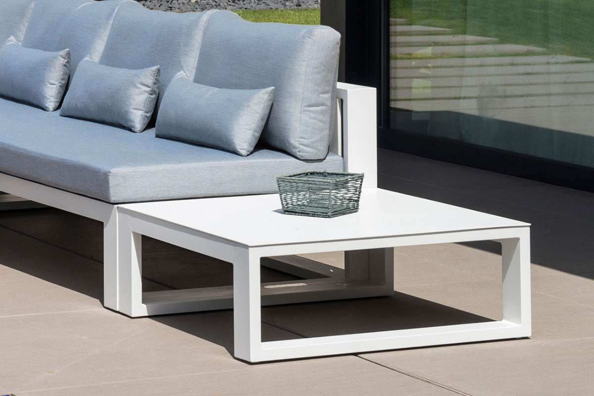 Salon jardin d'angle luxe en aluminium haut de gamme blanc, coussins en tissu 100% oléfine gris clair avec housse déperlante. 